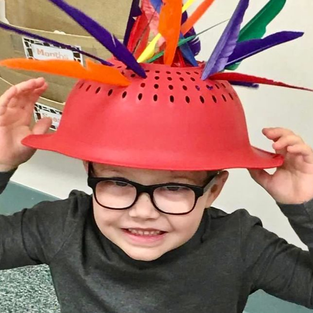 shadowbrook-weekday-school_feather-helmet.jpeg